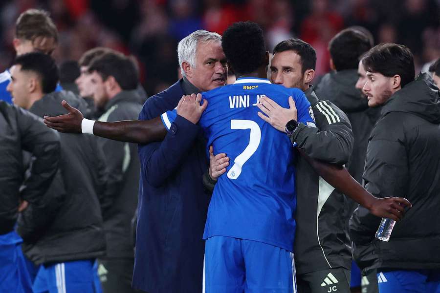 Real Madrid's Vinicius Junior with Benfica coach Jose Mourinho as the match was stopped due to racist chants 