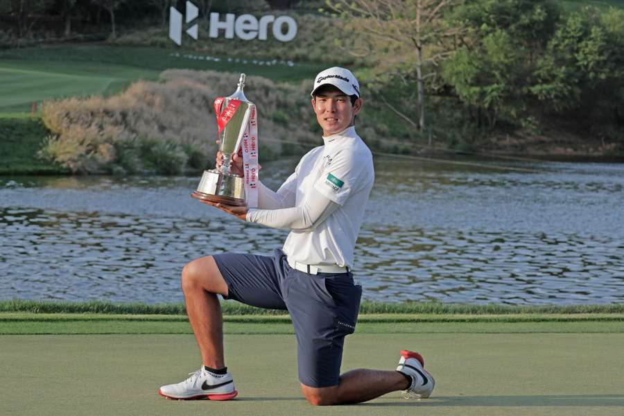 Nakajima poses with the trophy from his first DP World Tour win