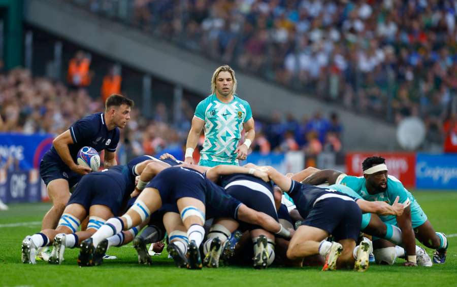 The two packs locked in combat during a scrum