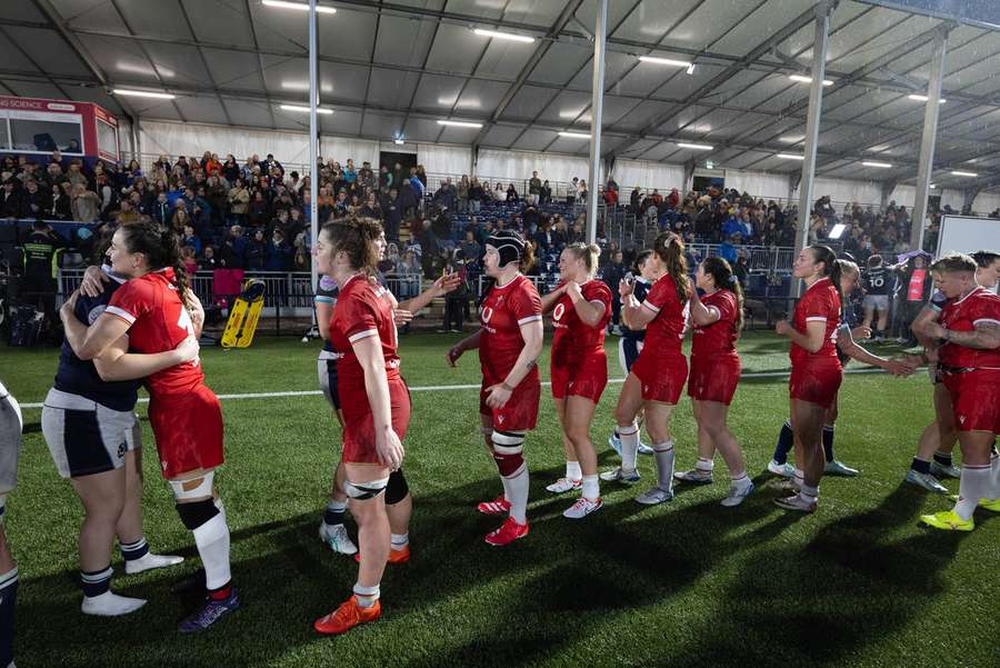 Wales and Scotland players congratulate each other after the match