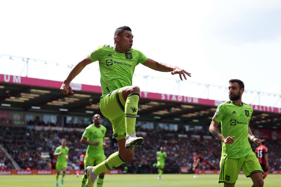 Manchester United's Brazilian midfielder Casemiro (C) celebrates after scoring the opening goal during the English Premier League football match between Bournemouth and Manchester United