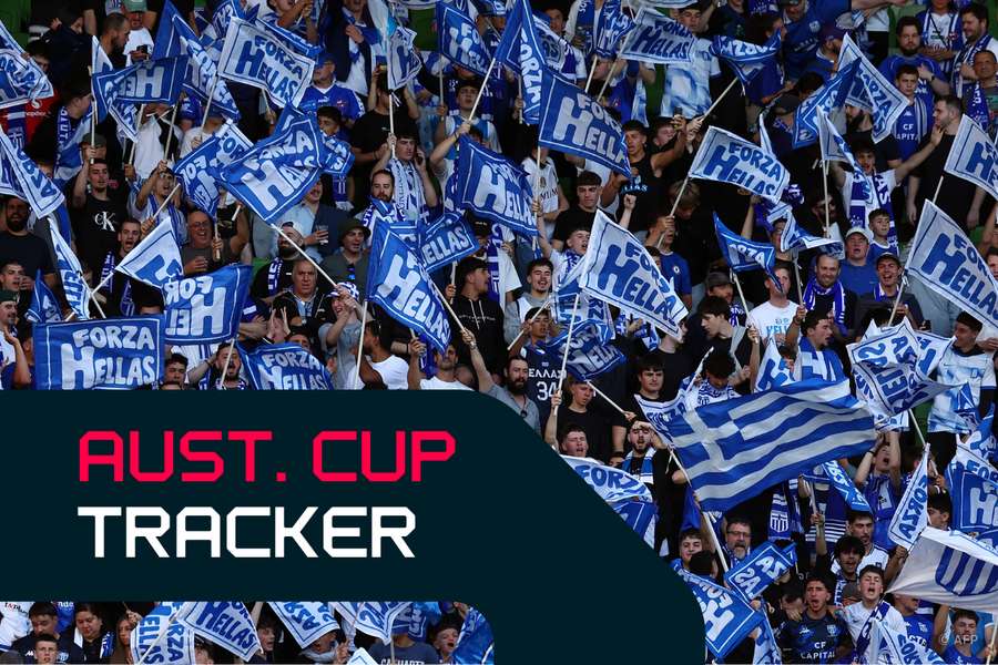 South Melbourne fans in full voice and colour during pre-game festivities. South Melbourne fans in full voice and colour during pre-game festivities.