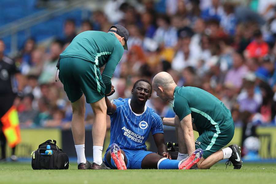 Yankuba Minteh of Brighton receives treatment during the pre-season friendly with Roma Yankuba Minteh of Brighton receives treatment during the pre-season friendly with Roma