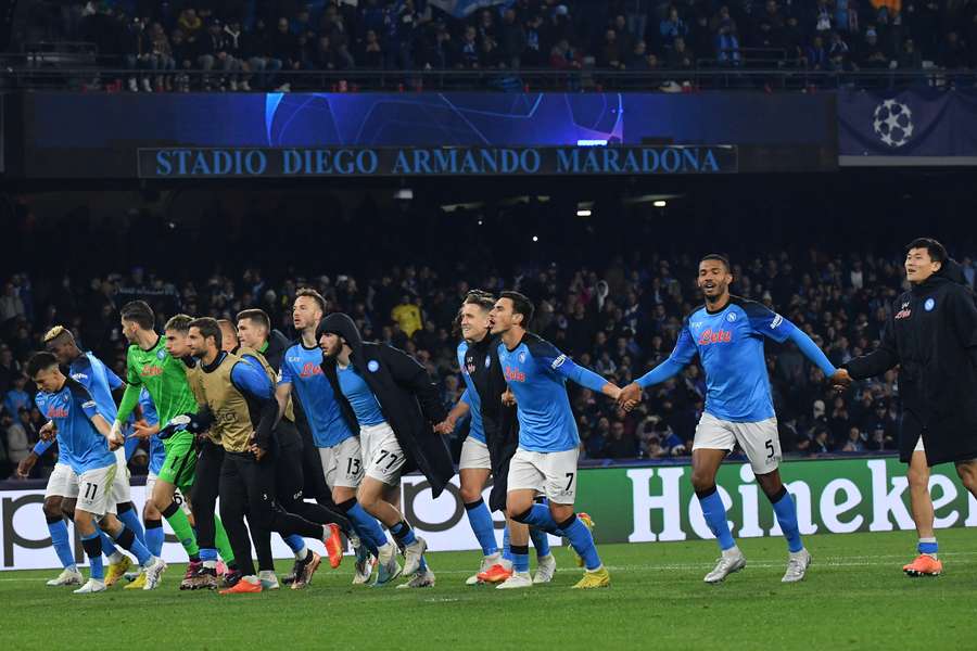 Napoli's players acknowledge the fans at the end of the UEFA Champions League round of 16 Napoli's players acknowledge the fans at the end of the UEFA Champions League round of 16