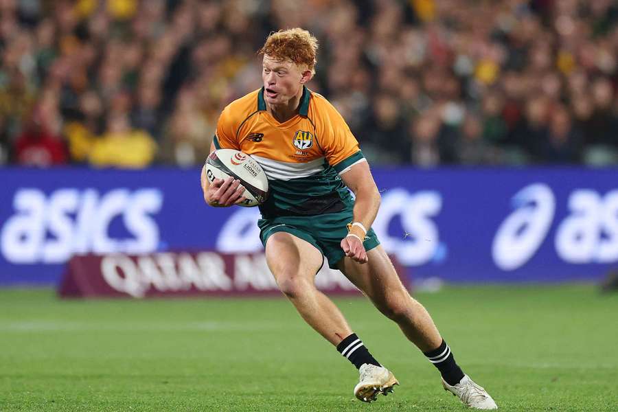 Tane Edmed runs with the ball when representing the Australia-New Zealand XV last weekend.