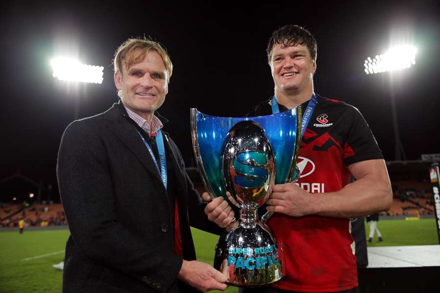Crusaders head coach Scott Robertson with captain Scott Barrett after winning the Super Rugby Pacific final