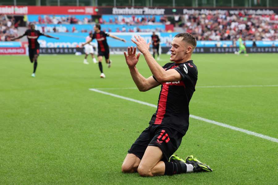 Florian Wirtz celebrates scoring Bayer's third