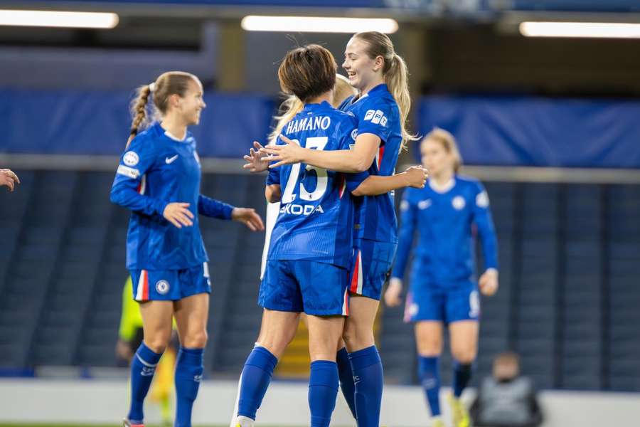 Chelsea players celebrate a goal Chelsea players celebrate a goal