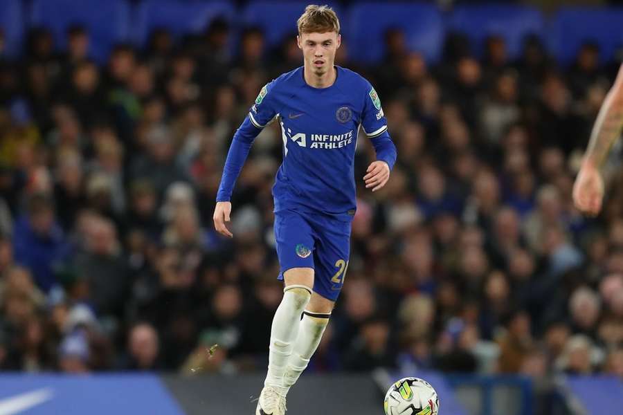 Chelsea's English defender Levi Colwill (centre) celebrates after scoring his team's third goal