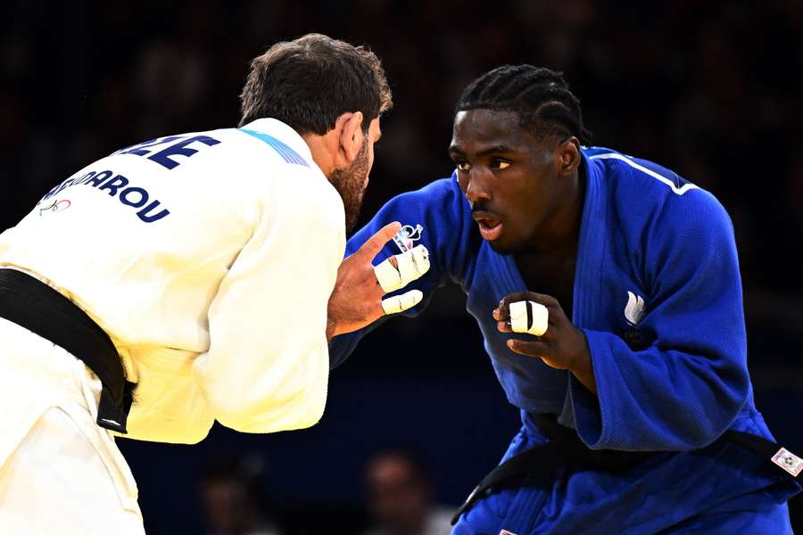 Joan-Benjamin Gaba of France in action against Hidayat Heydarov of Azerbaijan