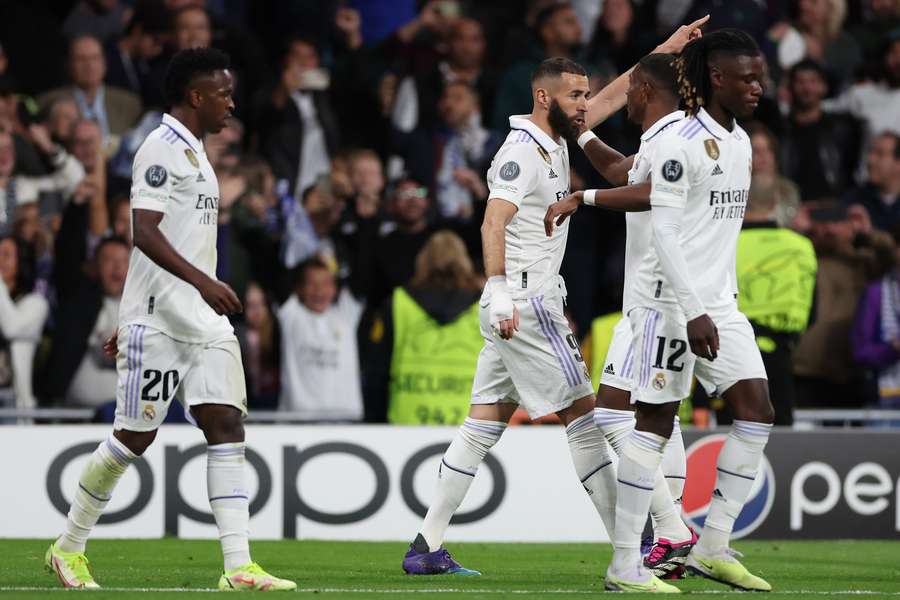 Real Madrid's French forward Karim Benzema celebrates scoring the opening goal