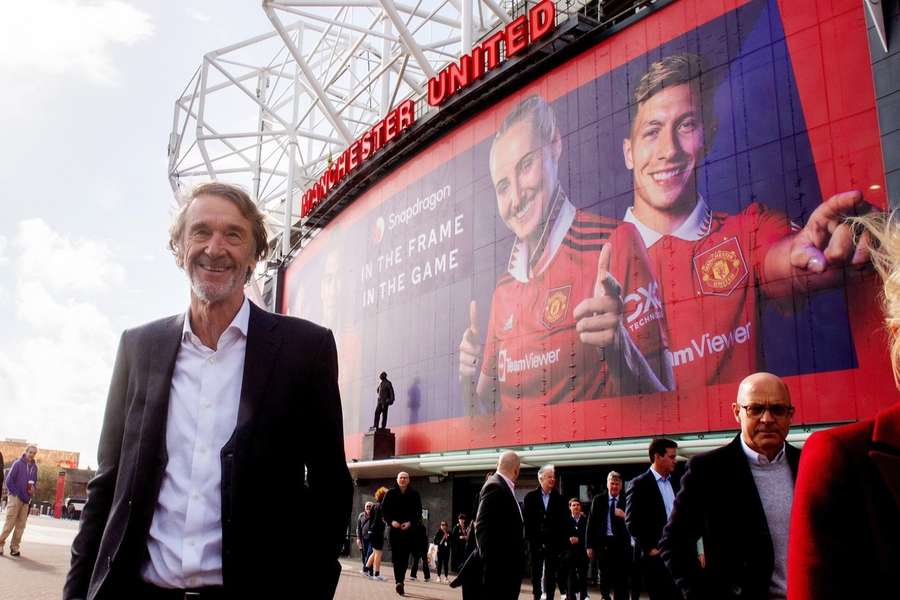 Jim Ratcliffe poses for a photo outside Old Trafford