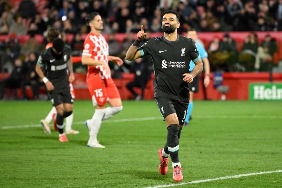 Mohamed Salah celebrates scoring the opening goal against Girona