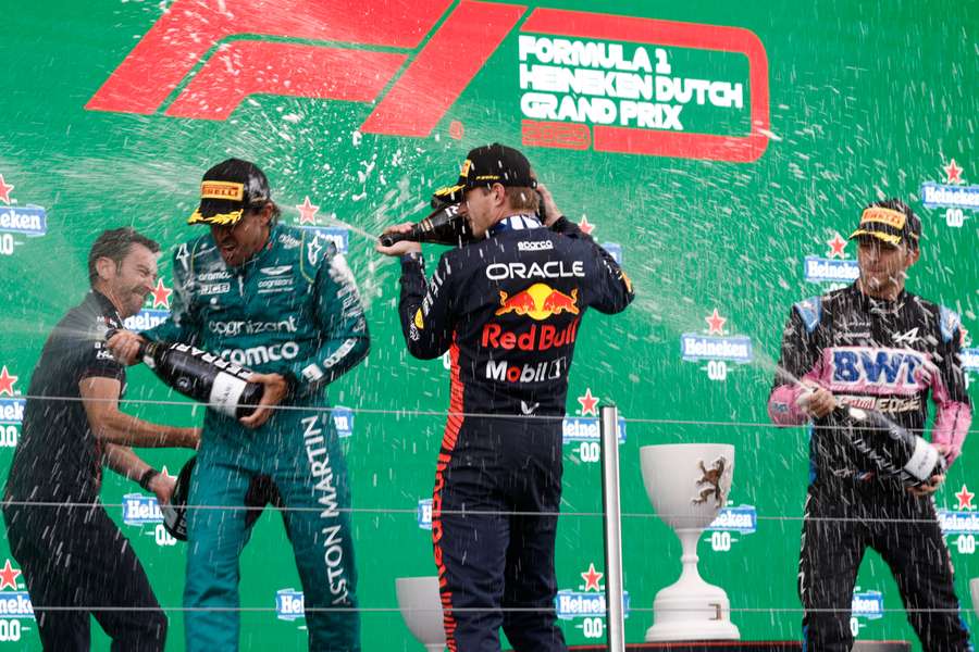 The podium drivers celebrate after the Dutch GP