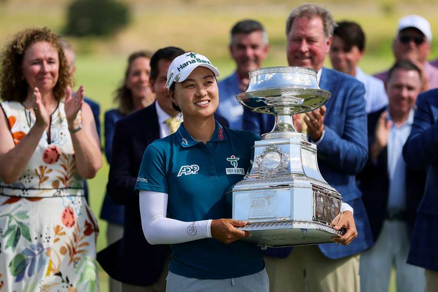 Minjee Lee of Australia poses with the trophy after winning the KPMG Women's PGA Championship 2025 Minjee Lee of Australia poses with the trophy after winning the KPMG Women's PGA Championship 2025