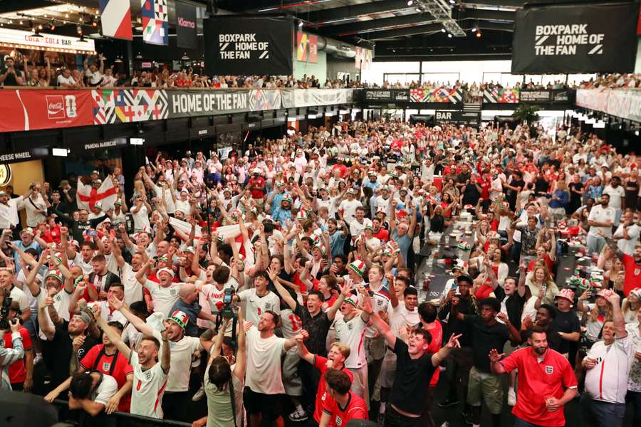 England fans celebrate after the match at BOXPARK Wembley England fans celebrate after the match at BOXPARK Wembley