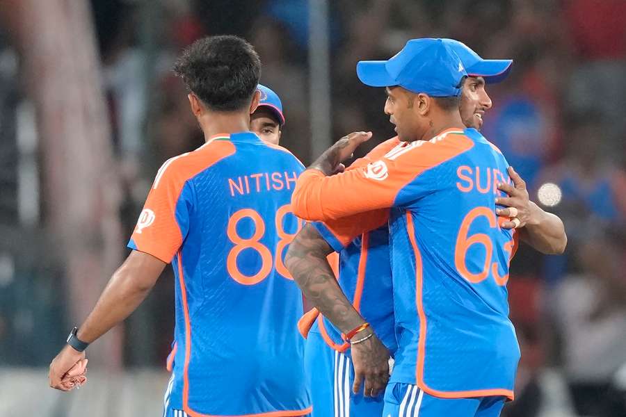 India's captain Suryakumar Yadav celebrates with teammates after winning the third and final T20 cricket match against Bangladesh