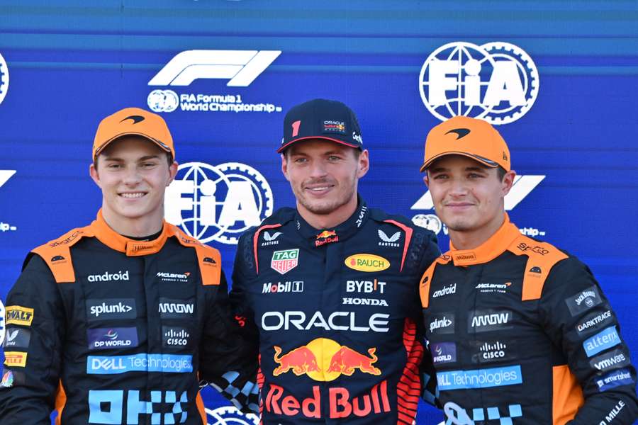 McLaren's Oscar Piastri (L), Red Bull Max Verstappen (C) and McLaren's Lando Norris pose after the qualifying session