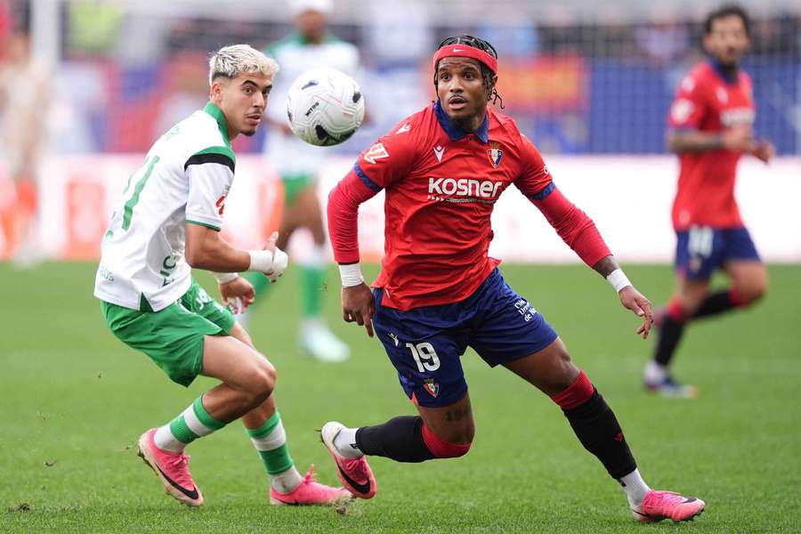 Osasuna's Valentin Rosier is challenged by Yassir Zabiri of Real Racing Club 