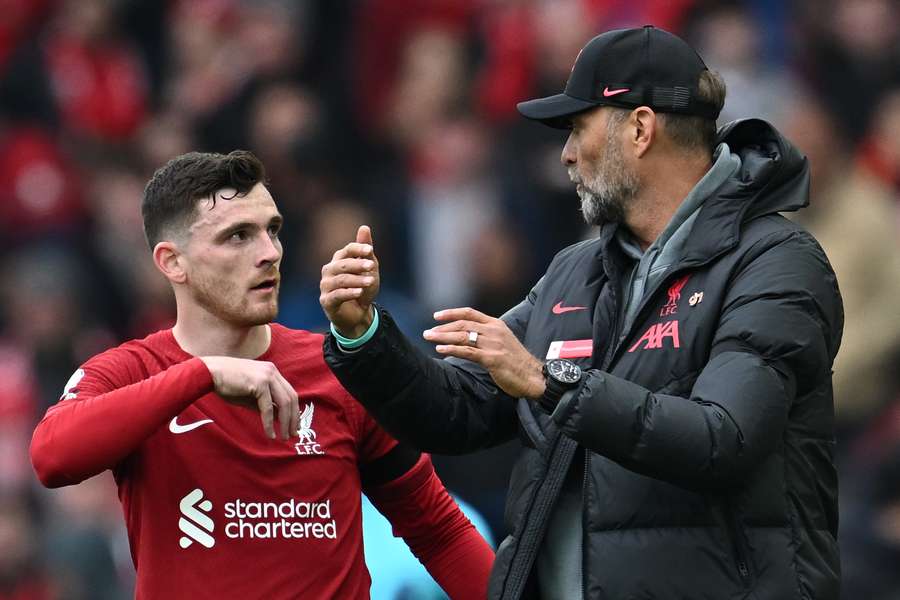Jurgen Klopp gives instructions to Liverpool's Scottish defender Andrew Robertson