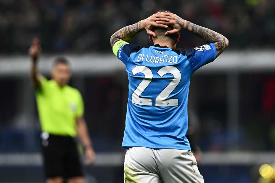 Napoli's Italian defender Giovanni Di Lorenzo reacts during the UEFA Champions League quarter-finals first leg