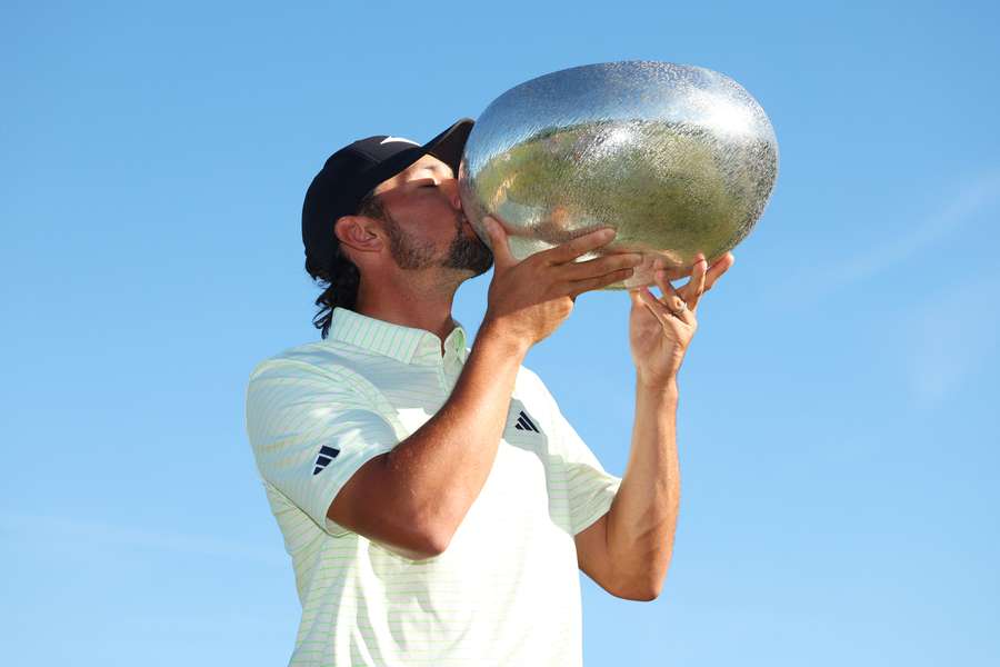 Marco Penge celebrates winning the Danish Golf Championship