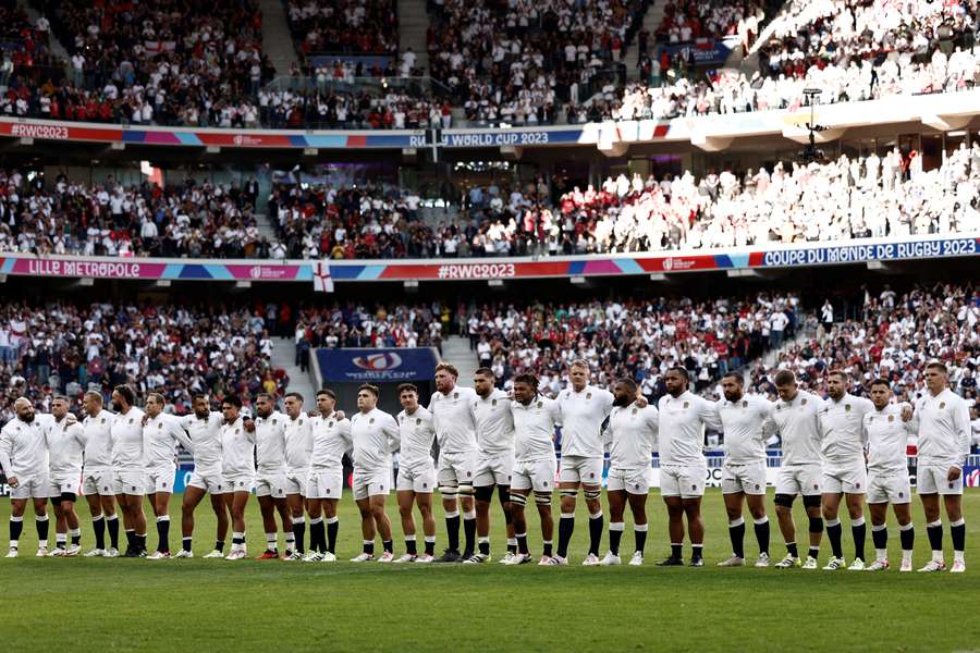 England's players line up for the national anthems ahead