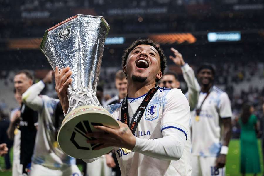 Sancho celebrates after winning the Europa League Sancho celebrates after winning the Europa League