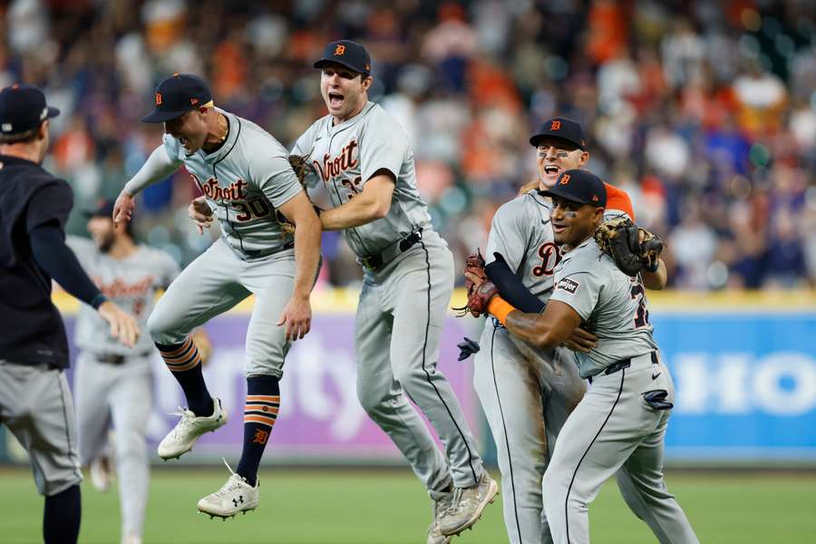 Kerry Carpenter, Colt Keith, Spencer Torkelson and Andy Ibanez of the Detroit Tigers celebrate after defeating the Houston Astros