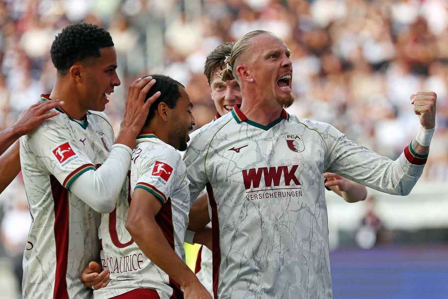 Augsburg have gone top of the Bundesliga Augsburg have gone top of the Bundesliga