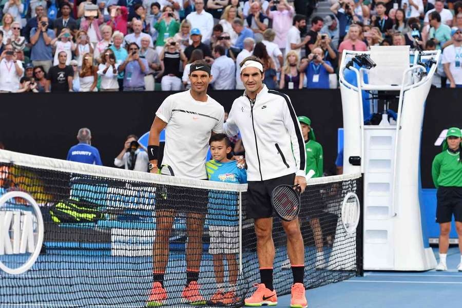Roger Federer of Switzerland (right) and Rafael Nadal of Spain pose for photographers