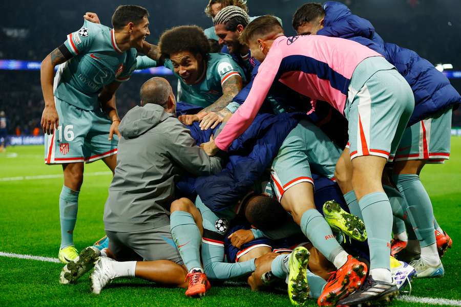 Atletico Madrid's Angel Correa celebrates scoring their second goal with teammates