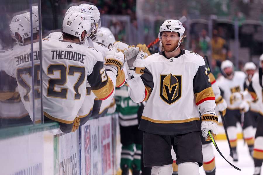 William Karlsson (R) of the Vegas Golden Knights celebrates with teammates on the bench