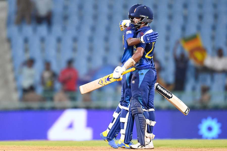 Sri Lanka's Sadeera Samarawickrama (R) celebrates with his teammate Dushan Hemantha