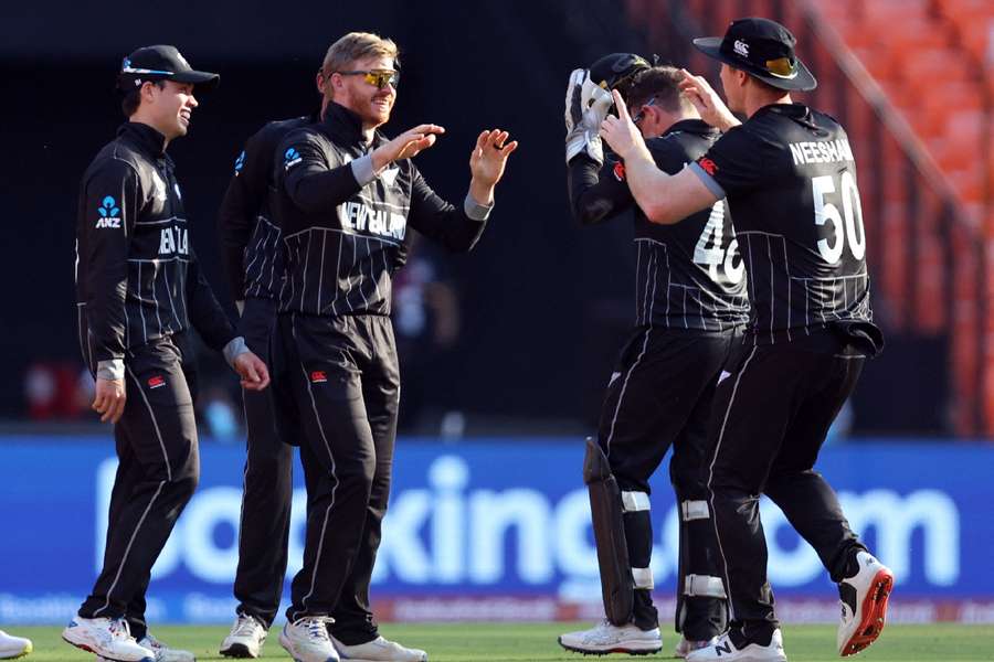 New Zealand celebrate the wicket of Root