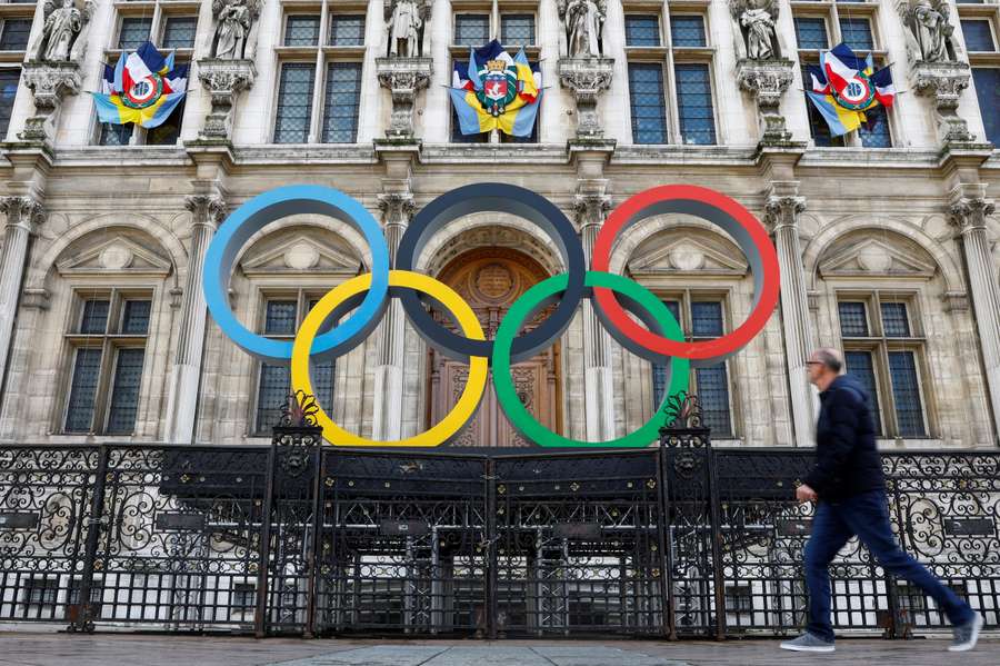 The Olympic rings are seen in front of the Hotel de Ville City Hall in Paris, France