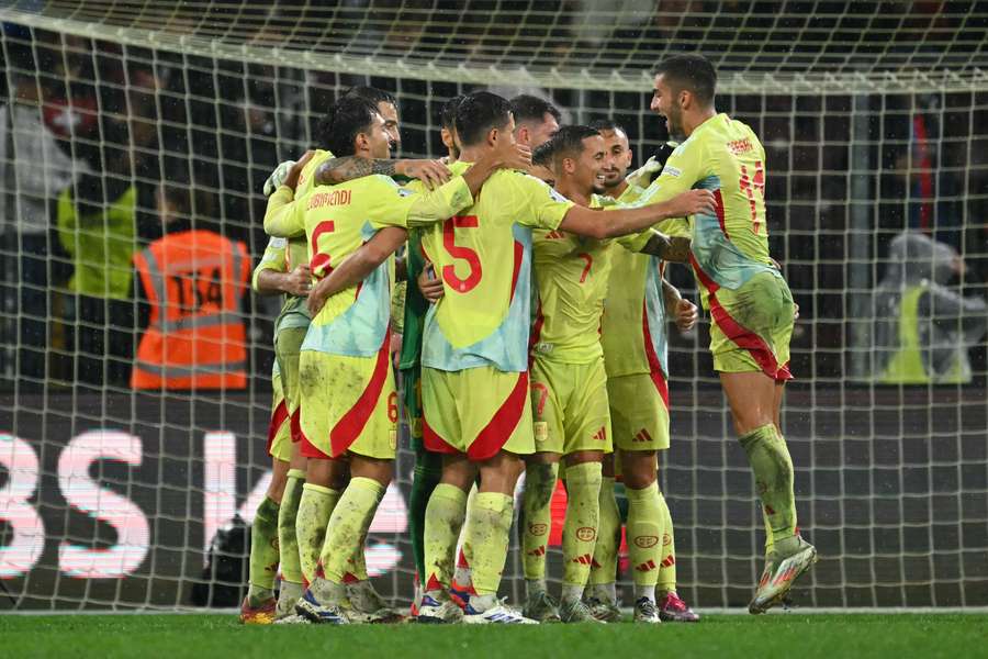 Spain overcome red card to put four past Switzerland in Nations League