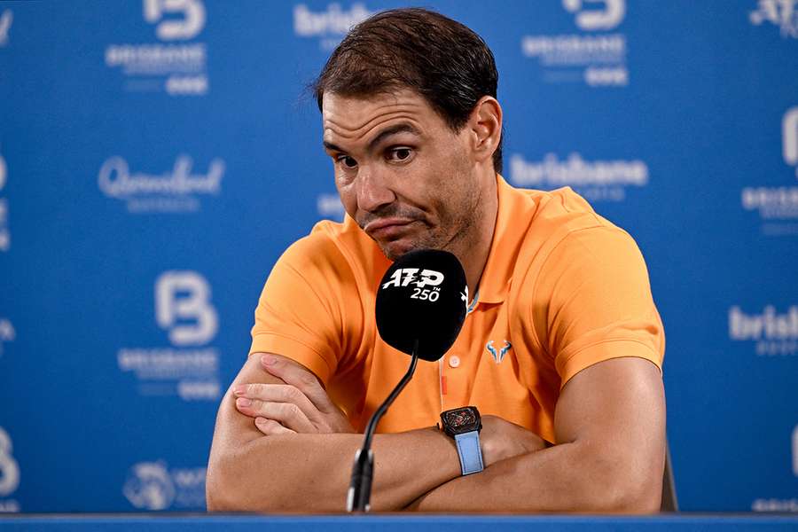 Nadal reacts during a press conference