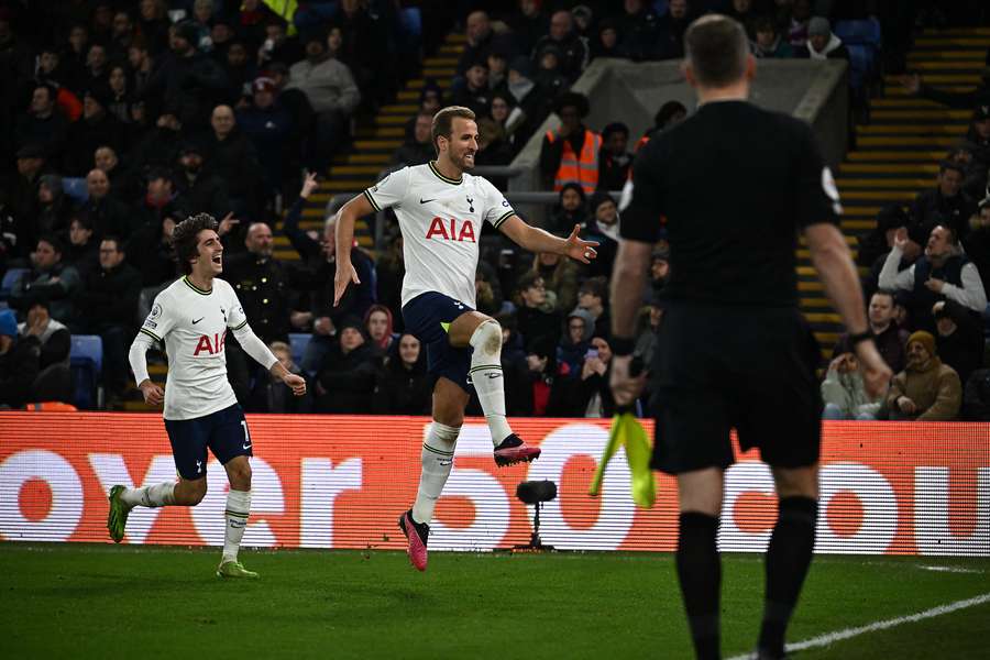 Harry Kane celebrates in front of Spurs' travelling fans