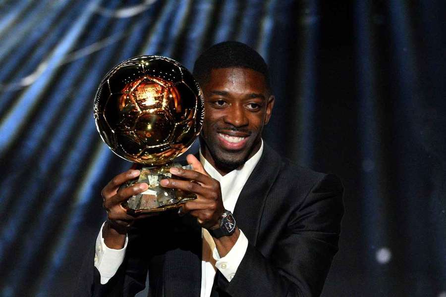 PSG's Ousmane Dembele poses with the men's Ballon d'Or award