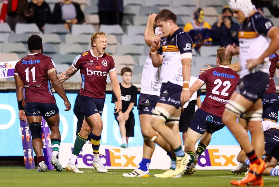 Carter Gordon celebrates his match-winning try for the Reds in Canberra on Saturday night.