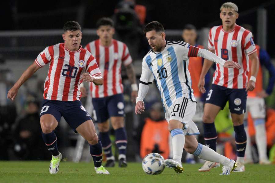 Messi runs at the Paraguay defence