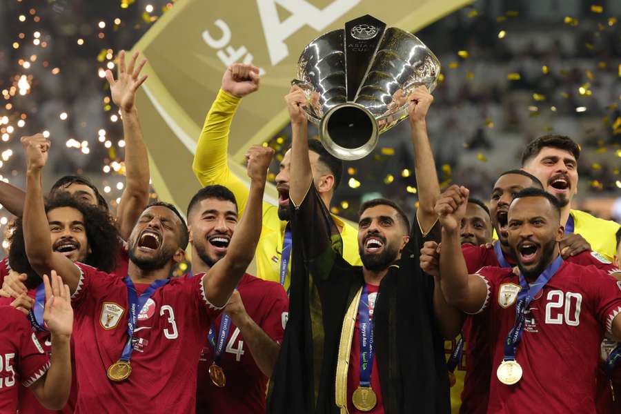 Hassan Al Haydos and his team after winning the Asian Cup in 2024