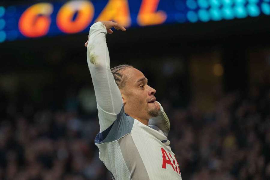 Xavi Simons celebrates after scoring for Tottenham