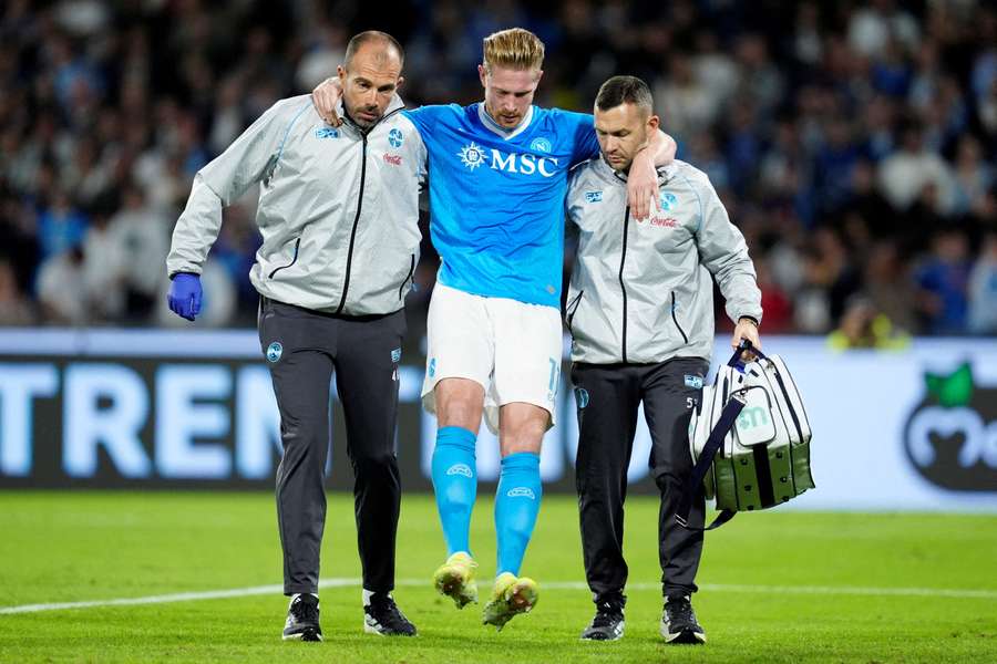Kevin De Bruyne is carried off the pitch Kevin De Bruyne is carried off the pitch
