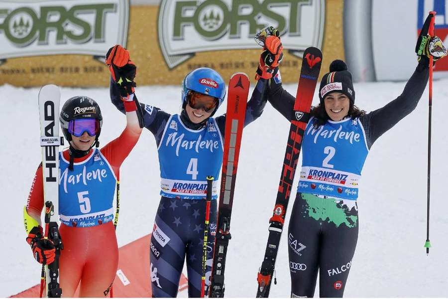 Shiffrin (centre) celebrates after breaking the record for women's world cup wins