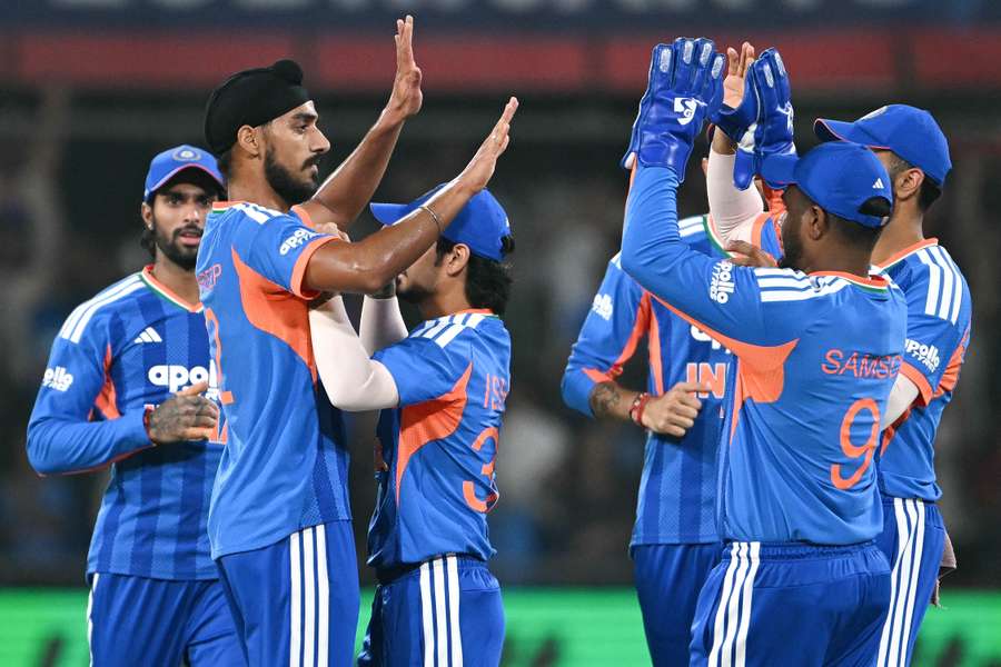 India's Arshdeep Singh celebrates with teammates after taking the wicket of West Indies captain Shai Hope India's Arshdeep Singh celebrates with teammates after taking the wicket of West Indies captain Shai Hope