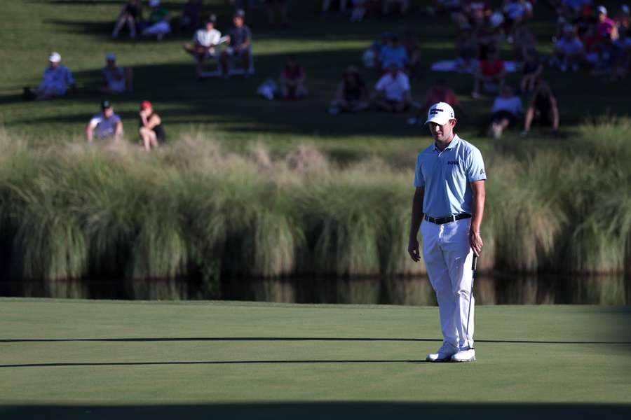 Cantlay prepares to putt on the 18th green during the third round of the Shriners Children's Open