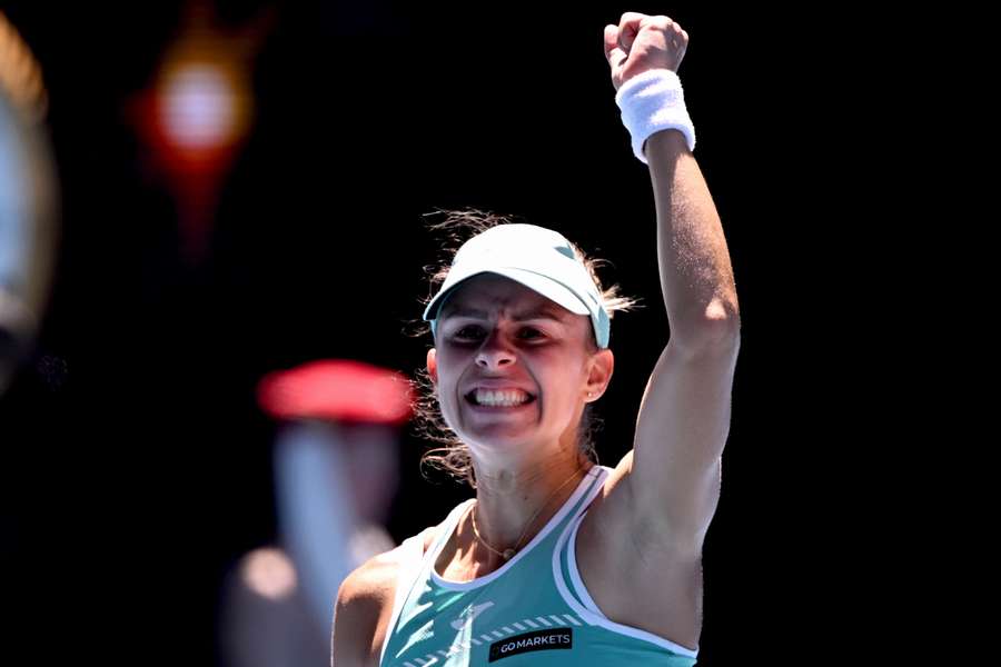 Poland's Magda Linette celebrates her victory against France's Caroline Garcia