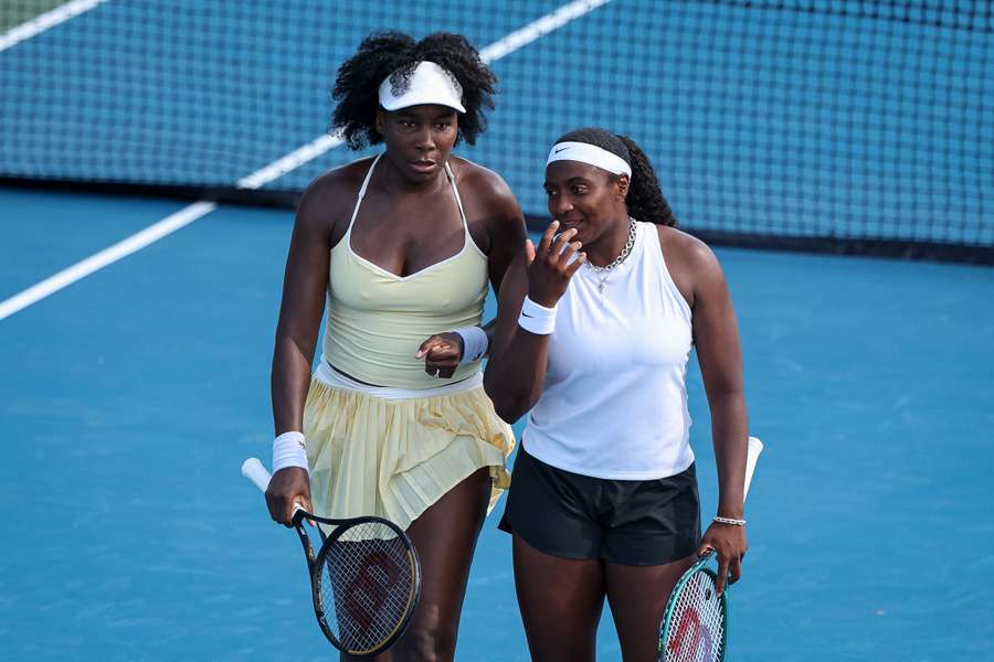 Venus Williams with doubles partner Hailey Baptiste.